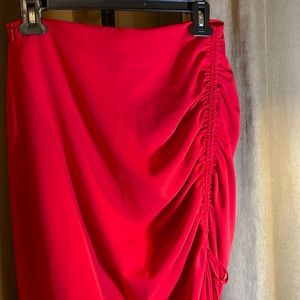 Never worn Zara red midi skirt size medium .